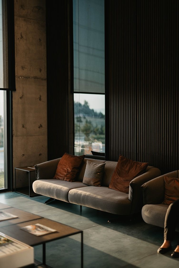 Dark timber-clad lounge